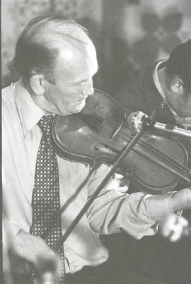 Bobby Casey playing fiddle [negative] / Joe Dowdall