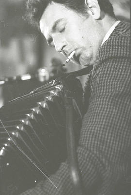 Paddy O'Brien playing accordion [negative] / Joe Dowdall