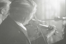 John Sr Kelly playing fiddle [negative] / Joe Dowdall