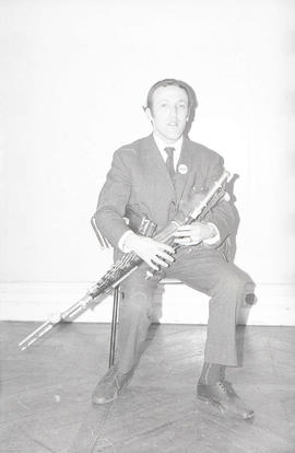 Paddy Moloney playing pipes [negative] / [unidentified photographer]