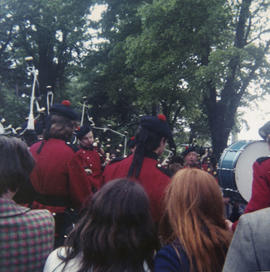 Unidentified pipe band playing for a crowd [negative] / [unidentified photographer]