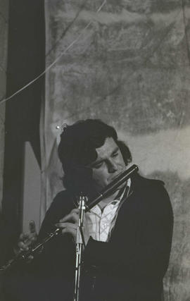 Unidentified musician playing flute [negative] / Joe Dowdall