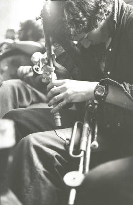Unidentified musician playing pipes [negative] / Joe Dowdall