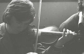 Tony Linnane playing fiddle [negative] / Joe Dowdall