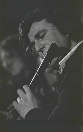 Unidentified musician playing flute [negative] / Joe Dowdall