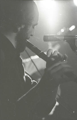 Matt Molloy playing flute [negative] / Joe Dowdall