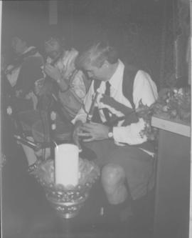 Unidentifed men in costume with bouzouki and pipes [negative] / [unidentified photographer]